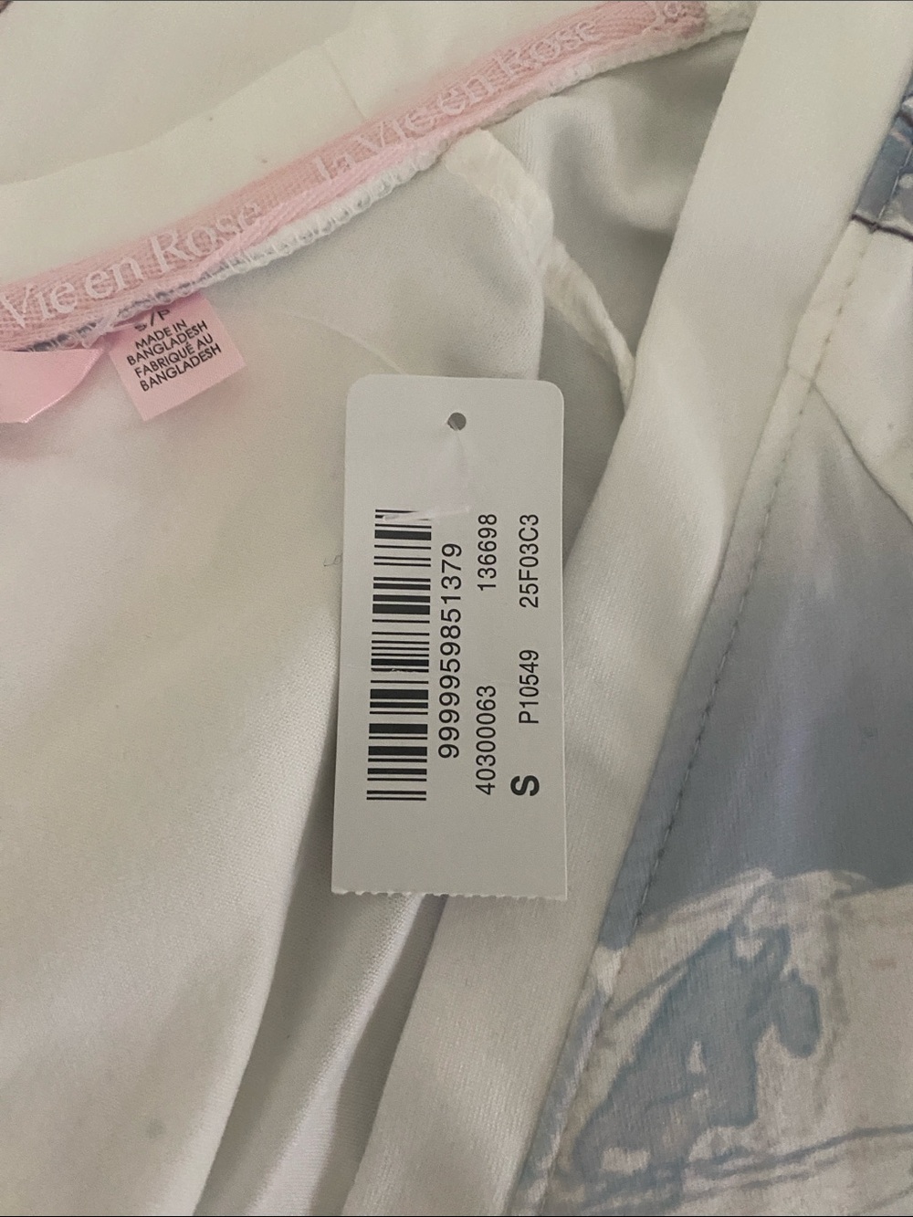White & Light Pink and Blue Sleep onesie